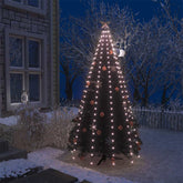 Net of 250 warm white LED lights draped over a snowy 8-foot Christmas tree at night.