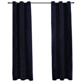 Black velvet blackout curtains with rings, two 37x84-inch panels, blocking light and providing privacy.