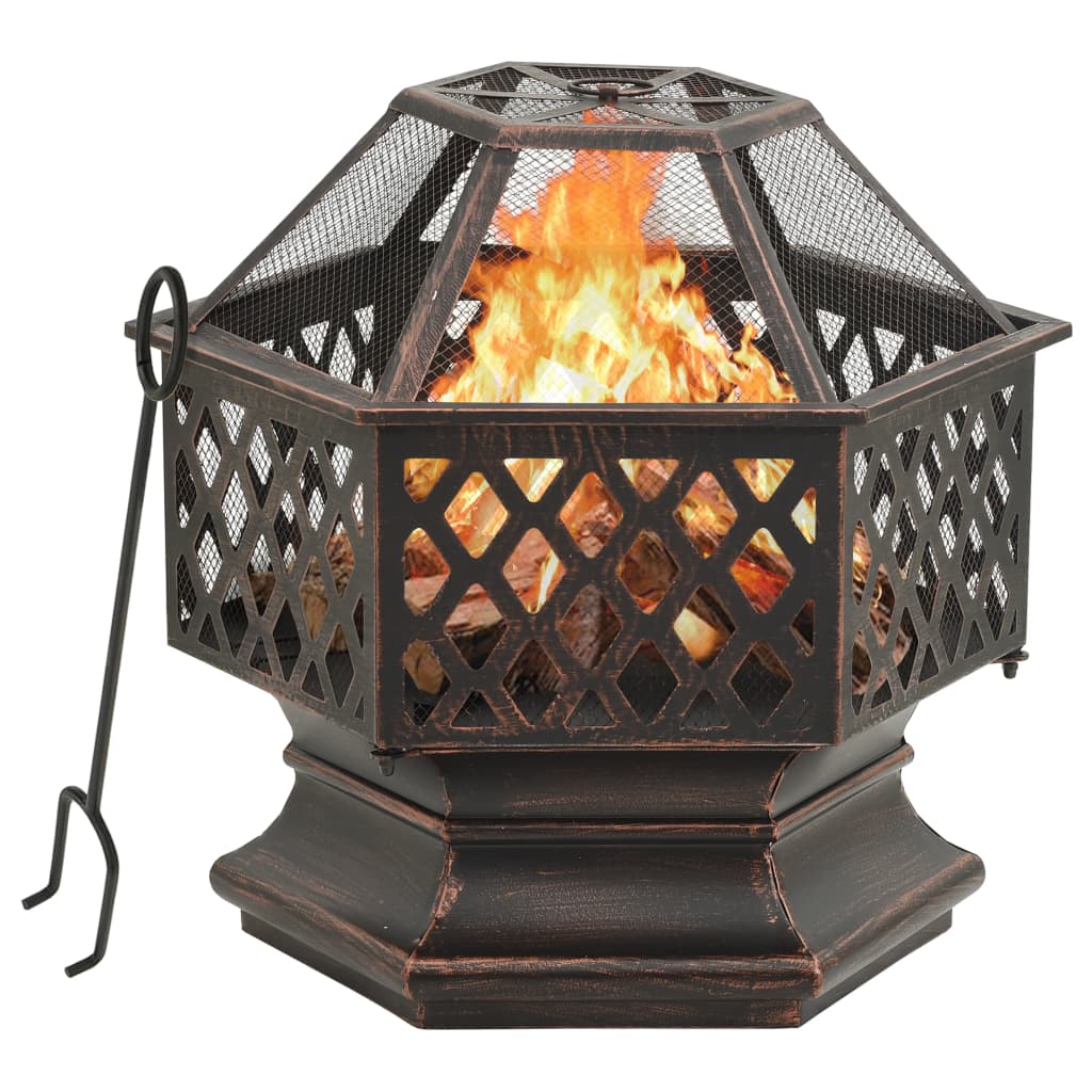 Octagonal rustic steel fire pit with burning logs, mesh guard, and poker.