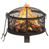 Rustic steel fire pit with 26.6-inch bowl, burning logs, mesh guard, and poker.