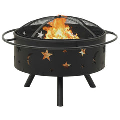 Black steel fire pit with star and moon cutouts, burning flames, mesh cover, poker, and tripod legs.