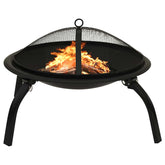 A black steel fire pit with a mesh spark screen and a fire burning inside.