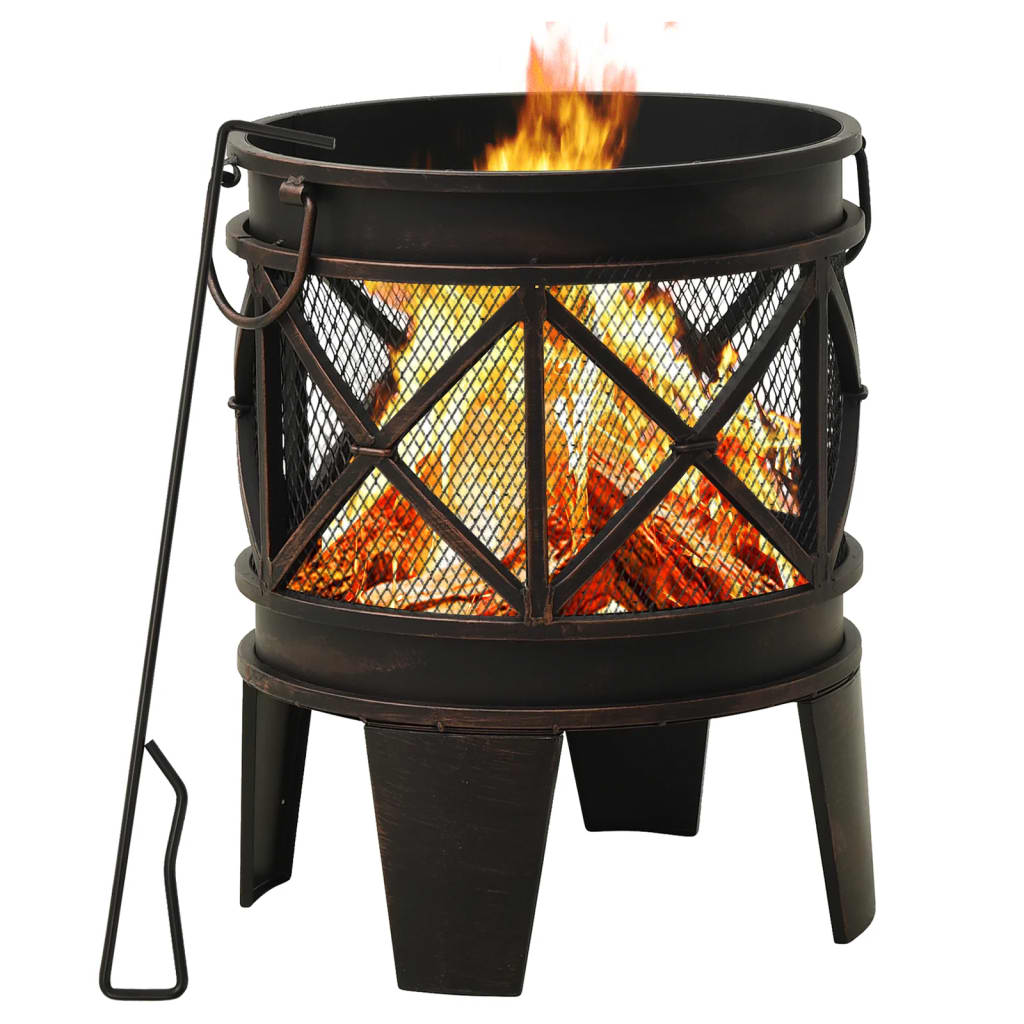 A rustic black-brown steel fire pit with a mesh body and burning logs, with a poker.