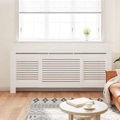White MDF radiator cover with shelf, adjustable from 55.9 to 80.7 inches, installed over a window radiator in a living room.