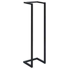 Black iron towel rack with four rungs, measuring 9.8 x 7.9 x 37.4 inches.