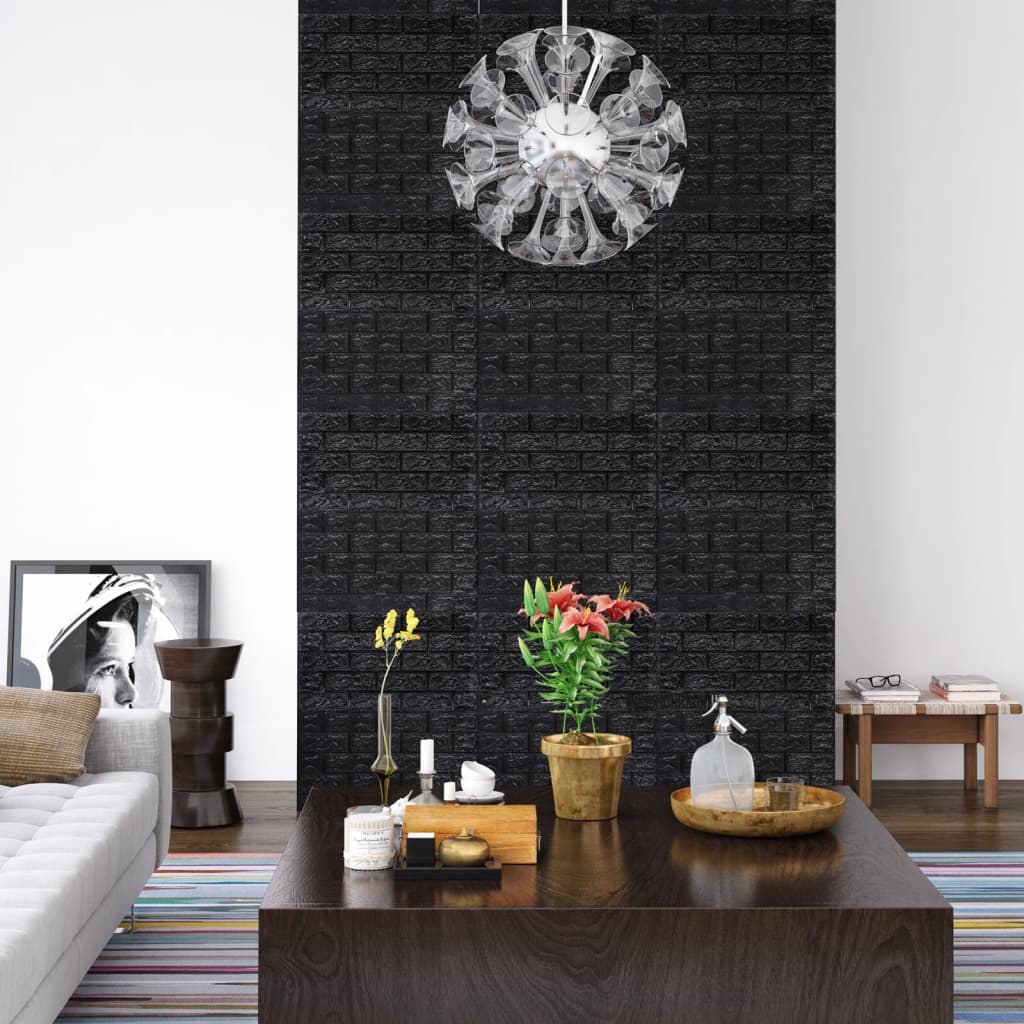Black self-adhesive 3D brick wallpaper applied to a wall above a wooden coffee table.