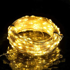 A coiled 49.2ft USB copper wire string light with 150 warm white LEDs glowing on a black background.