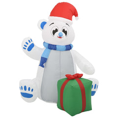 A 6ft inflatable polar bear wearing a hat and scarf, illuminated by energy-saving LED lights.