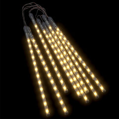 8 strands of 1ft warm white LED meteor rain lights with 192 LEDs, cascading downward.