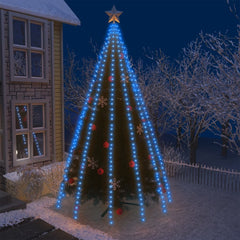 Blue LED Christmas tree lights with 500 bulbs illuminating a snowy outdoor tree at night.