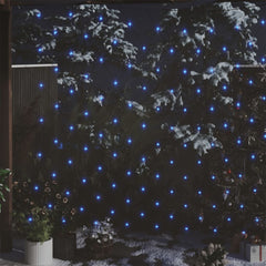 Blue LED Christmas net lights, 9.8 by 6.6 feet with 204 LEDs, draped on snowy trees outdoors.