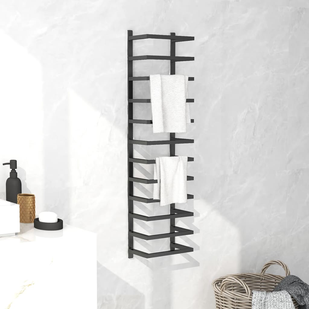 Black steel wall-mounted towel rack, 37.8 inches tall, holding white towels in a bathroom.