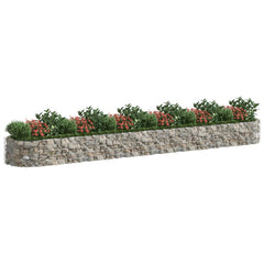 Long galvanized iron gabion raised bed with stone fill and plants inside, measuring 236x39x20 inches.