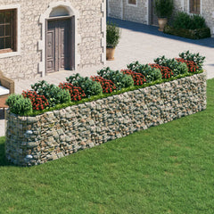 Galvanized iron gabion raised garden bed, 236x39x39in, with stone walls and red flowers.