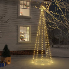A 10 ft outdoor Christmas tree with 310 warm white LEDs and ground spike, glowing against a snowy house at night.