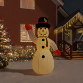 A 145.7-inch inflatable LED snowman made of white Oxford fabric, standing in a snowy yard with a black hat, red gloves, and green scarf.