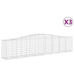 Set of three arched galvanized iron gabion baskets measuring 157.5 by 19.7 by 31.5/39.4 inches.