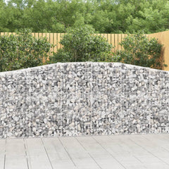Two galvanized iron arched gabion baskets filled with light gray stones.