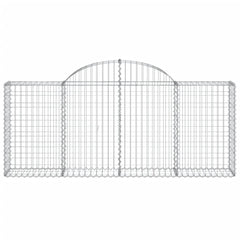 Four galvanized iron arched gabion baskets for garden walls, filled with rocks or gravel.