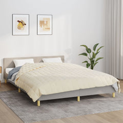 Light cream Bostome weighted blanket on a bed, measuring 86.6x92.5 inches and weighing 24.3 pounds.