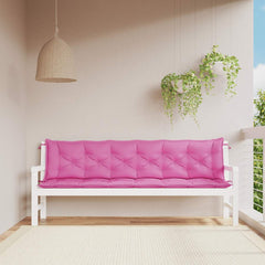 Two pink outdoor bench cushions made of durable, water-repellent polyester fabric.