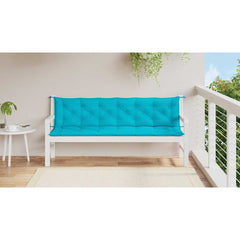 Turquoise outdoor bench cushions with durable fabric and non-slip ties for secure placement.