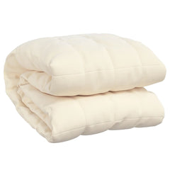 Light cream Bostome weighted blanket, 22 lb, folded with quilted pattern.