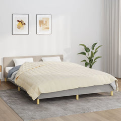 Light cream Bostome weighted blanket on a queen bed in a modern bedroom.
