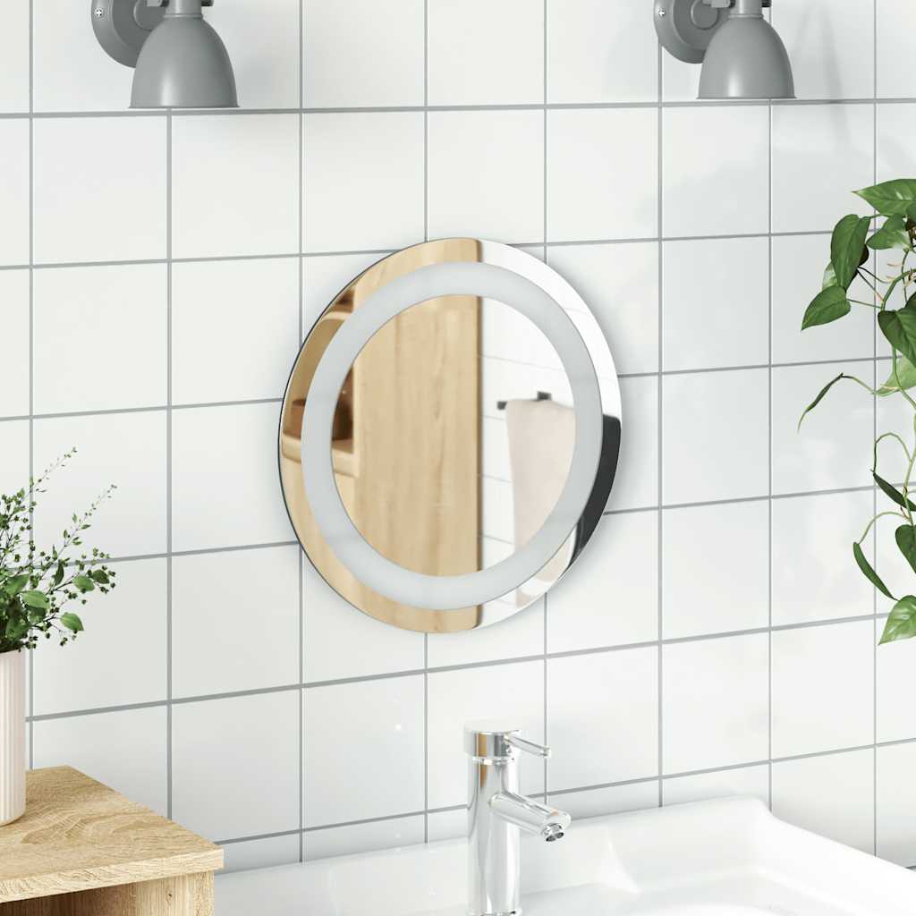 11.8-inch round LED bathroom mirror with edge lighting, mounted on white tiled wall above sink.