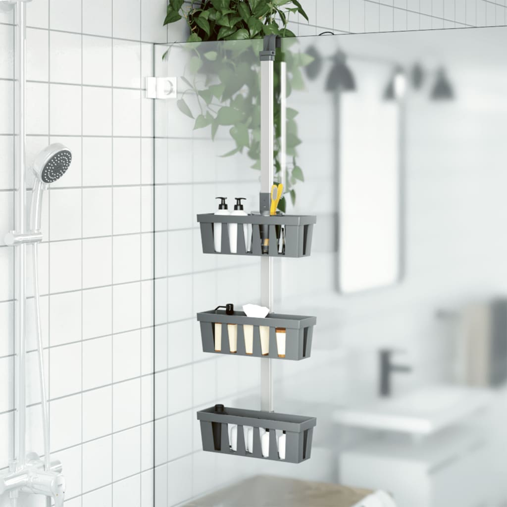 Silver 3-tier adjustable aluminum shower hanger shelf with baskets mounted on a pole in a tiled shower.