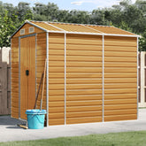 Light brown galvanized steel garden shed with a sloped roof and ventilation for outdoor storage.