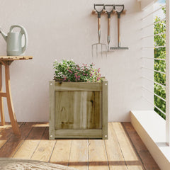 A 15.7-inch square impregnated pine wood garden planter with pink flowers on a sunny balcony.