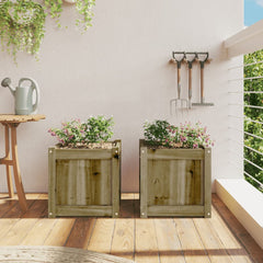 Two 15.7-inch square impregnated pine wood planters with pink flowers on a balcony.