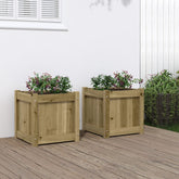 Two square pine wood garden planters with flowers, each 15.7 inches tall.