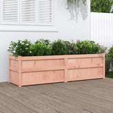 Rectangular solid Douglas wood garden planter with green plants, 70.9 by 19.7 by 19.7 inches.