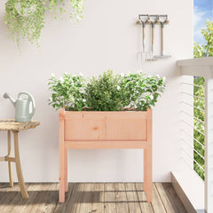 Wooden garden planter with legs, 27.6x12.2x27.6 inches, filled with green plants.