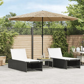 Brown garden parasol with steel pole open over two black lounge chairs on a patio.