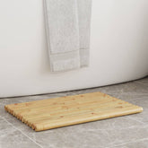 Two bamboo bath mats, each 19.7x13.8 inches with slatted design, placed near a white bathtub with a gray towel hanging nearby.
