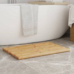 Two bamboo bath mats, each 27.6 by 19.7 inches, placed on a bathroom floor near a white bathtub.