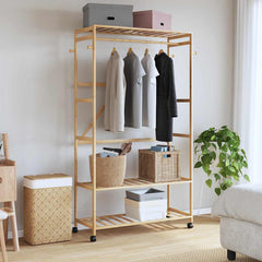 Bamboo clothes rack with shelves, hanging rod, hooks, and wheels, 43.3 inches wide.