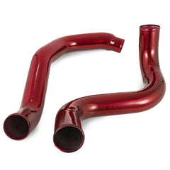Two shiny red curved metal pipes for a turbo intercooler system are shown on a white background.