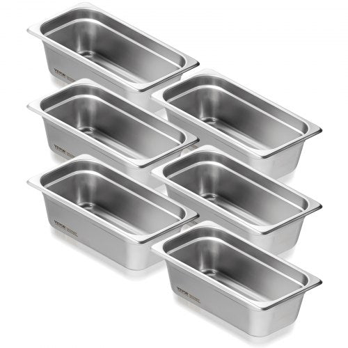 Six 1/3-size stainless steel steam table pans, 4 inches deep, stacked neatly.