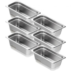 Six 1/3-size stainless steel steam table pans, 4 inches deep, stacked neatly.
