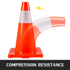 Red 18-inch PVC traffic cone with reflective collar, shown flexing to demonstrate compression resistance.