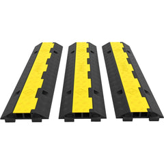 Three heavy-duty rubber cable protector ramps with dual channels and slip-proof texture.