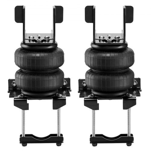 Pair of black air bag suspension units with mounting brackets for trucks.