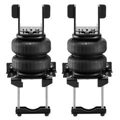 Pair of black air bag suspension units with mounting brackets for trucks.