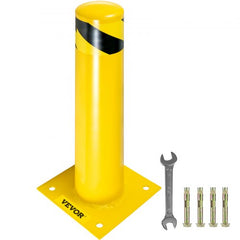 Yellow steel safety bollard, 24 inches tall with black stripes, base plate, and anchor bolts.
