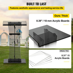 Clear acrylic pulpit with black base, storage shelf, and thick panels on grass.