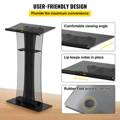 Clear acrylic pulpit with black base, 47 inches tall, featuring slanted reading surface, lip, storage shelf, and rubber feet.